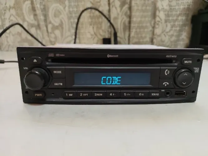 Rádio Automotivo Cd Bluetooth Gm Agile Bom Estado precisa do Codigo