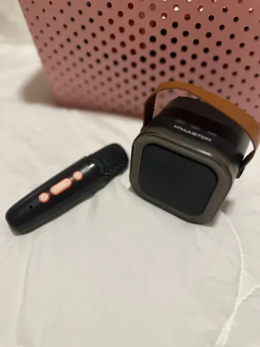 Vendo caixinha de som com microfone