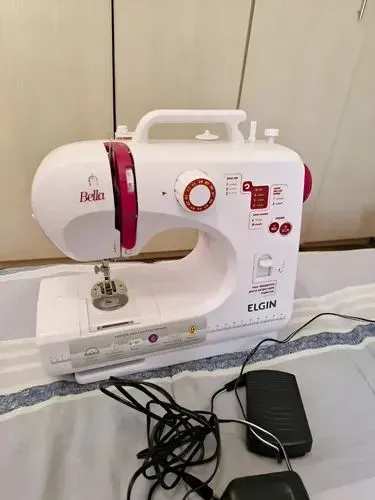 Máquina de costura elgin