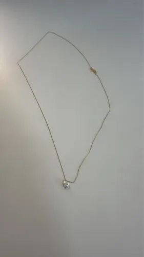 Cordão de ouro com pingente