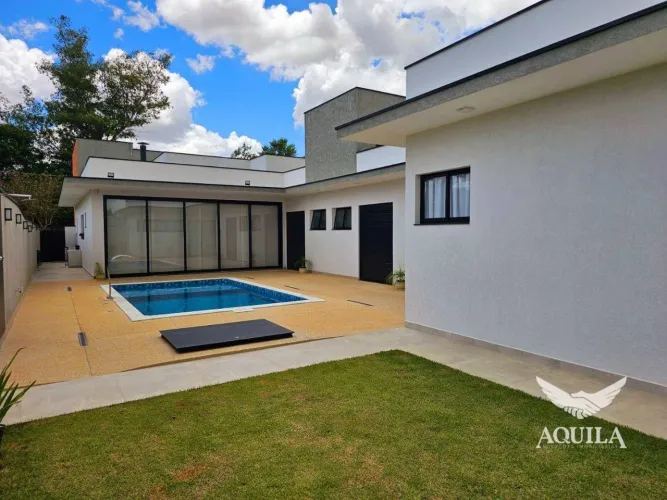 CASA TÉRREA COM 03 SUÍTES - PISCINA - PLACA FOTOVOLTAICA - ESCRITÓRIO - GOURMET - CONDOMÍN