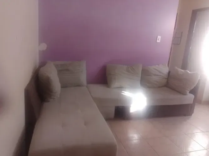 Sofá de canto + Puff - R$ 100,00