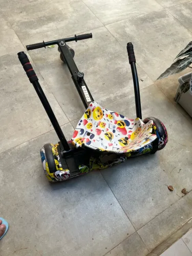 Vendo hoverboard com adaptador para carrinho de rolimã