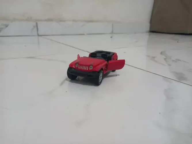 carinho de ferro que abre ais porta Jeep