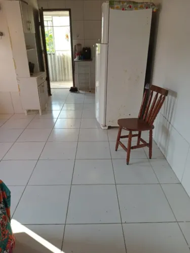 IMÓVEL, ÁREA NA FRENTE, ÁREA NO FUNDO, IMÓVEL ESCRITURADO E OUTRO IMÓVEL DA MESMA FORMA,