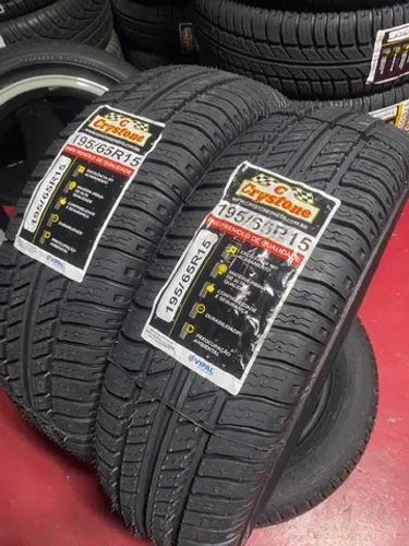 Par de pneus 195/65r15 remolde Crystone 