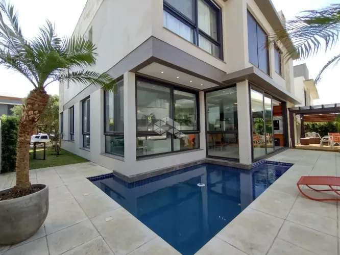 Casa em Condomínio à venda, no condomínio Playa Vista - Xangri-Lá, com 4 quartos (4 suítes