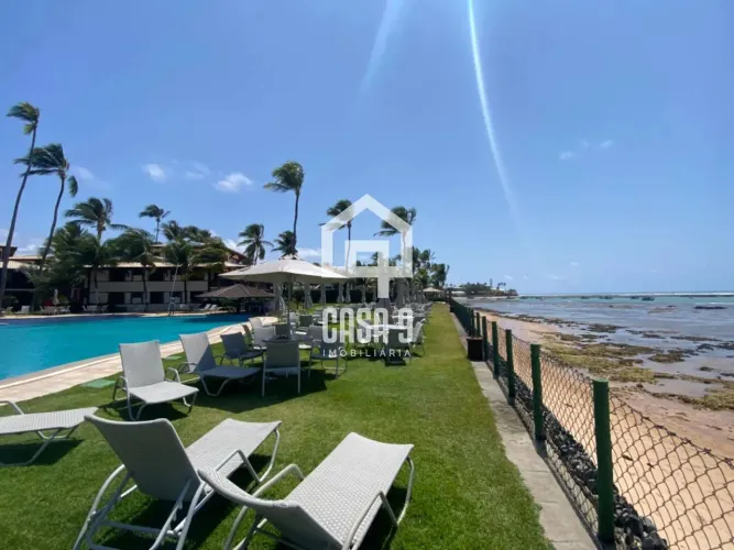 Apartamento a venda com 2 suítes no condomínio Bali Bahia frente mar em Praia do Forte Bah