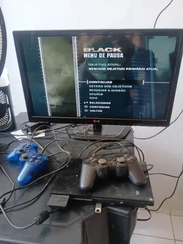 PlayStation 2 Slim Obs:(jogos apenas pelo pen drive)