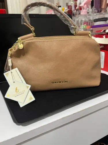 Bolsa do pavão de ouro, nunca usada 