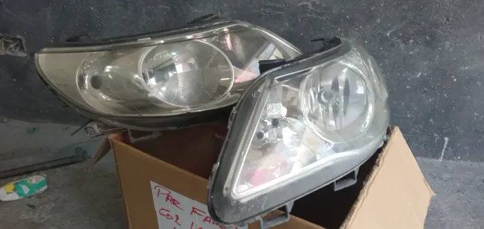 Par de farol g5 gol voyage usado cromado