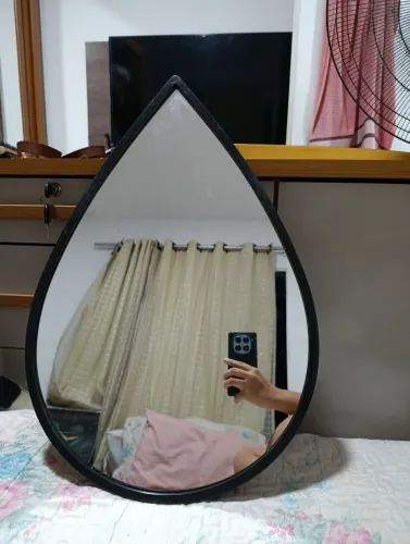 Vende-se espelho em formato de gora