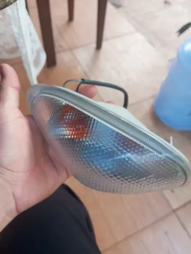 Pisca dianteiro lado direito da Suzuki katena