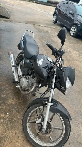 Titan 2012 deve 2.700$ de multa moto toda original