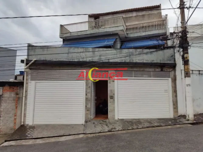 SOBRADO COM 8 QUARTOS, SENDO 4 SUÍTES, 4 VAGAS DE GARAGEM E 5 CASAS NA VILA GUILHERME EM S