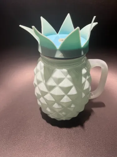 Caneca de abacaxi azul em vidro