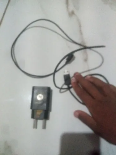 Esse carregador e original esse que do Motorola moto Es6 se você não confiar que é o
