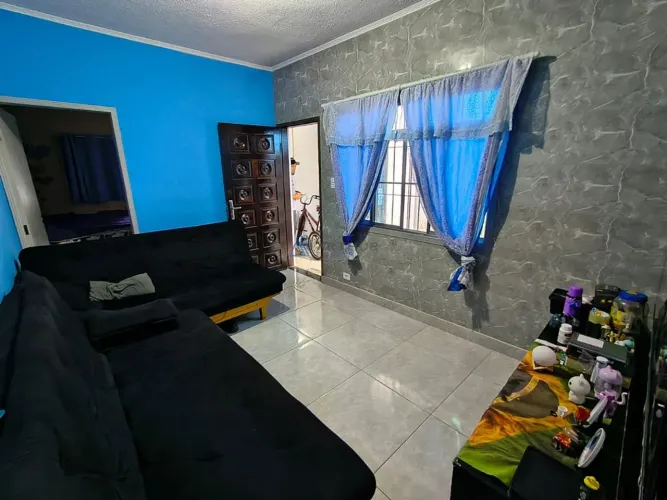 Casa geminada à venda na Tupi em Praia Grande, 2 quartos, 2 banheiros e 2 vagas