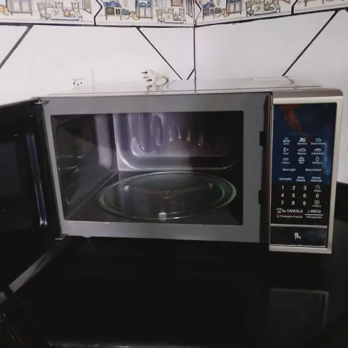 MICROONDAS LG 30 LITROS LATERAIS PRATA DENTRO AÇO INOX ESCOVADO ALTO LIMPANTE