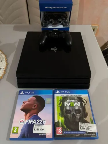 Ps4 pro,com dois controles e dois jogos,aparelho impecável
