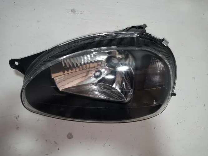Farol Principal Corsa 00/ LE Lente Lisa M.Negra (Novo)