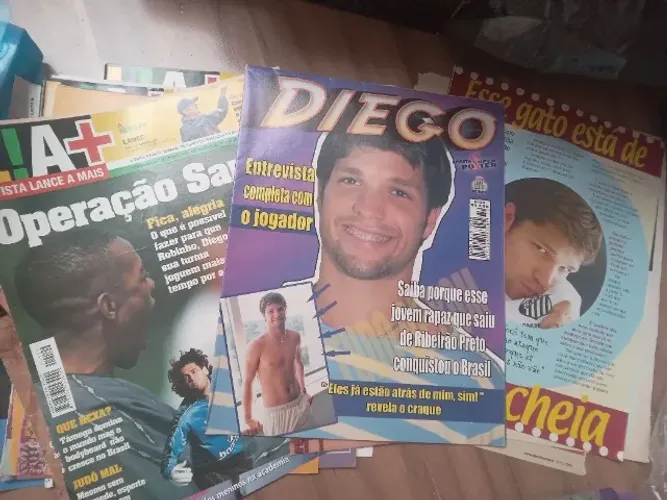 Pôsteres e recortes de revistas 