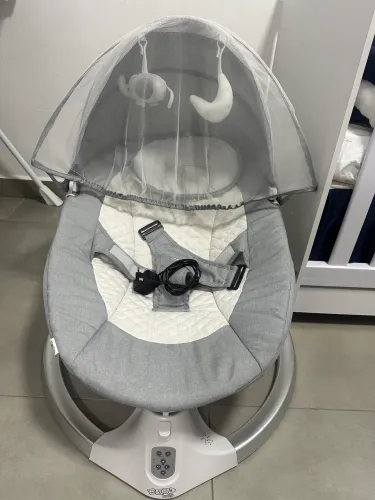 Cadeira de descanso e balanço maxi baby