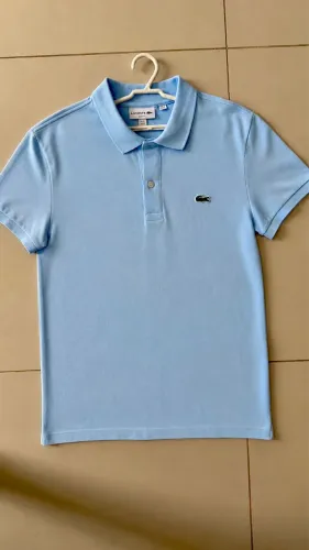 Camisa polo azul Lacoste infantil