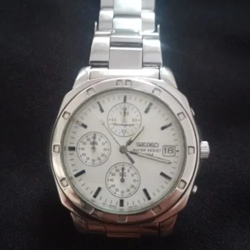 Relógio Seiko original, funcionando normal hora e data, só não os ponteiros pequenos.