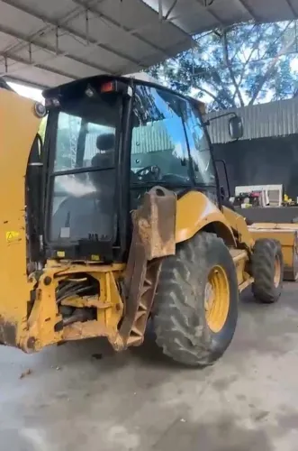 Retroescavadeira 310K