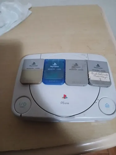 Ps1 slim com 4 memory cards leia a descricao