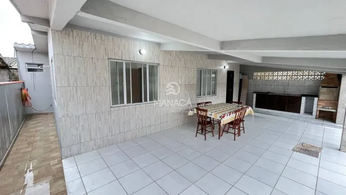 Casa em condomínio toda com laje 1 quarto + 1 suíte 2 garagens 2 churrasquieras