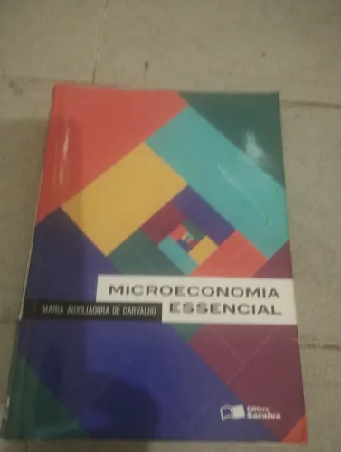 MICROECONOMIA ESSENCIAL - Maria Auxiliadora de Carvalho; livro usado, em bom estado.