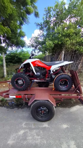 Quadlicliclo raptor 350 yamaha com reboque emplacado. Troco por cb 500x