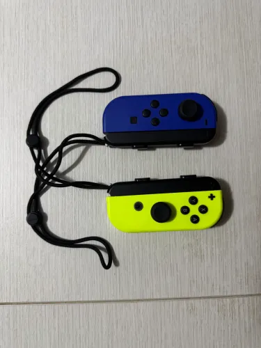 Controles Joycons Nintendo Switch - Azul e Amarelo