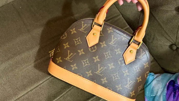 Bolsa alma Louis Vuitton