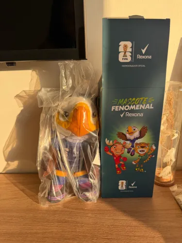 MASCOTE REXONA COPA DO MUNDO 2026 CLUTCH