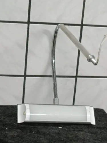 Luminária caltini laboratório de prótese dental