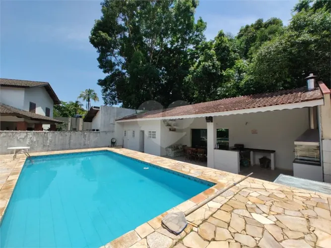 Casa com 4 quartos à venda em Riviera - SP