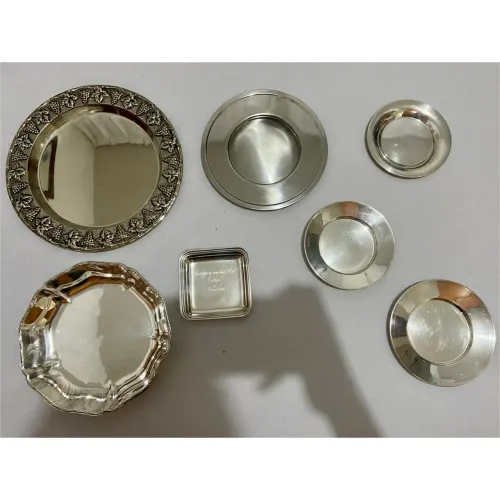 Lote com 7 peças decorativas pratas
