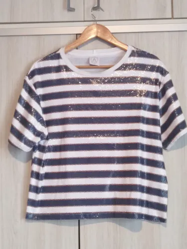 Blusa listrada metalizada 