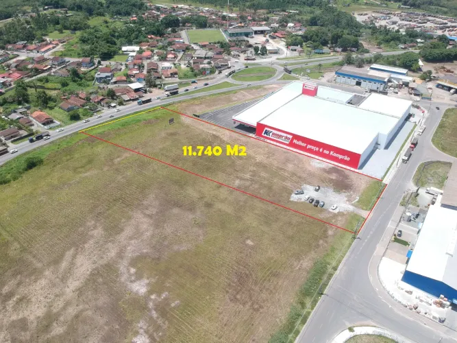 ÀREA INDUSTRIAL COM 11780 M2 AO LADO DO KOMPRÃO CENTRO ARAQUARI SC