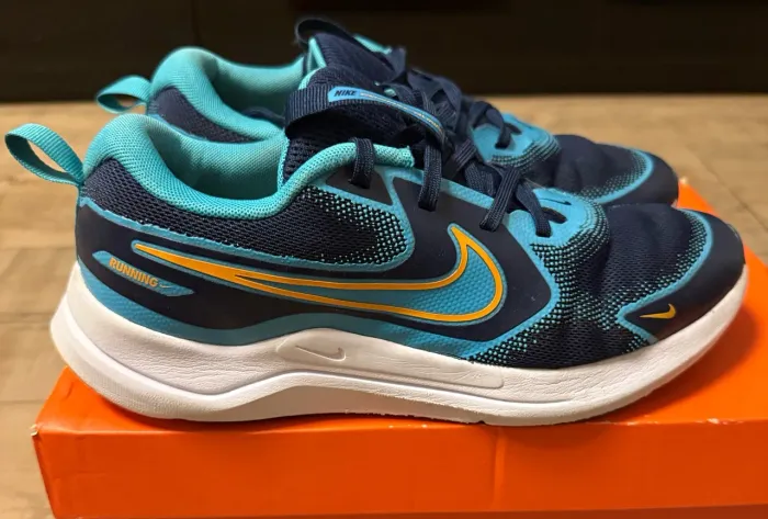 Tênis Nike Cosmic Runner + Mochila