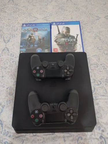 Ps4 1tb + 2 controles+3 jogos todos os cabos incluso
