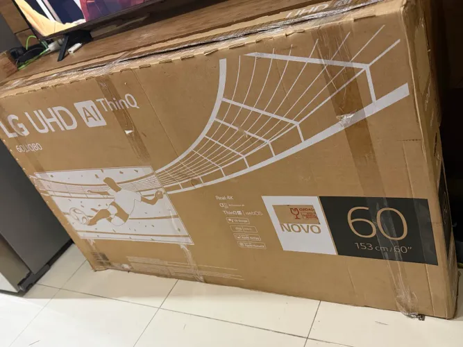 Tv smart 60 polegadas LG na caixa modelo com vídeo game integrado zera
