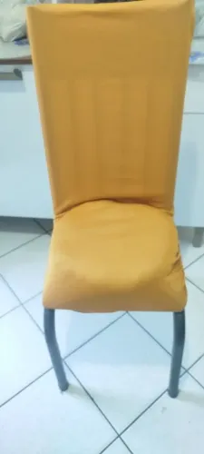Vendo conjunto novo de 4 capas de cadeiras assento redondo na cor mostarda
