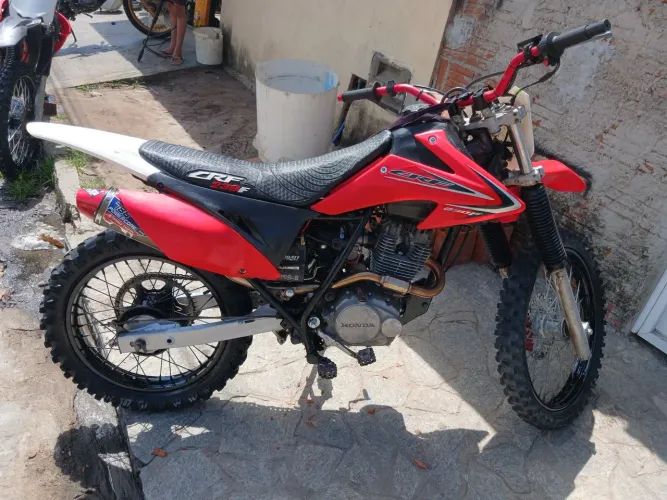 Nx 200 , pra crf 230 , moto pra trilha com recibo , troco em moto de menor valor com volta