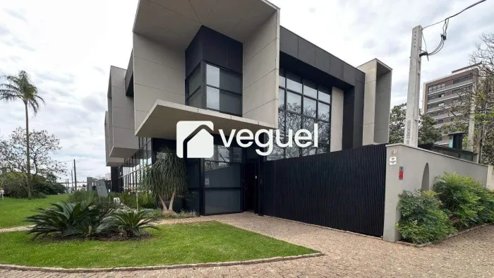 Pédio comercial de 402m², com 10 salas e 4 vagas de garagem para alugar no bairro Nova Cam
