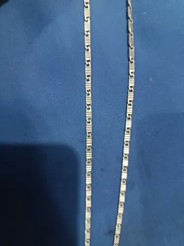 Corrente de prata com um negócio de pulseira de prata