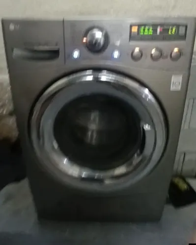 Vendo Máquina lava e seca LG 12kg dando erro LE